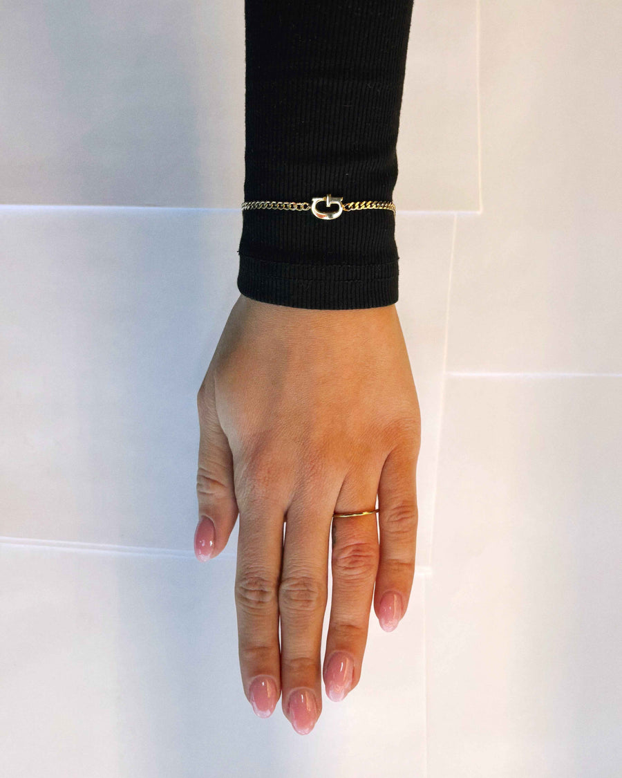 BOGSTAV ARMBÅND FORGYLDT